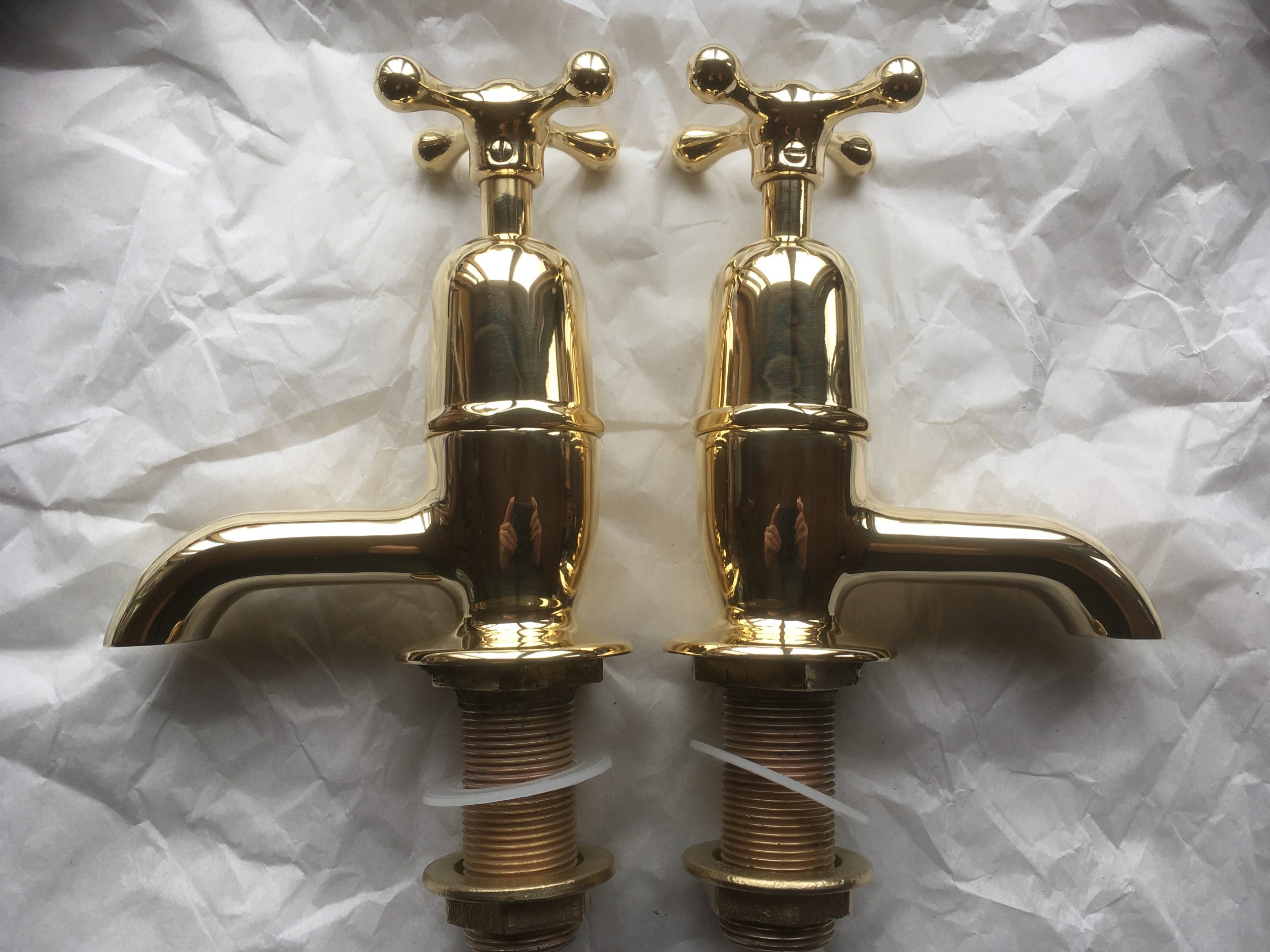 Read more about the article Polished brass Bath taps.
