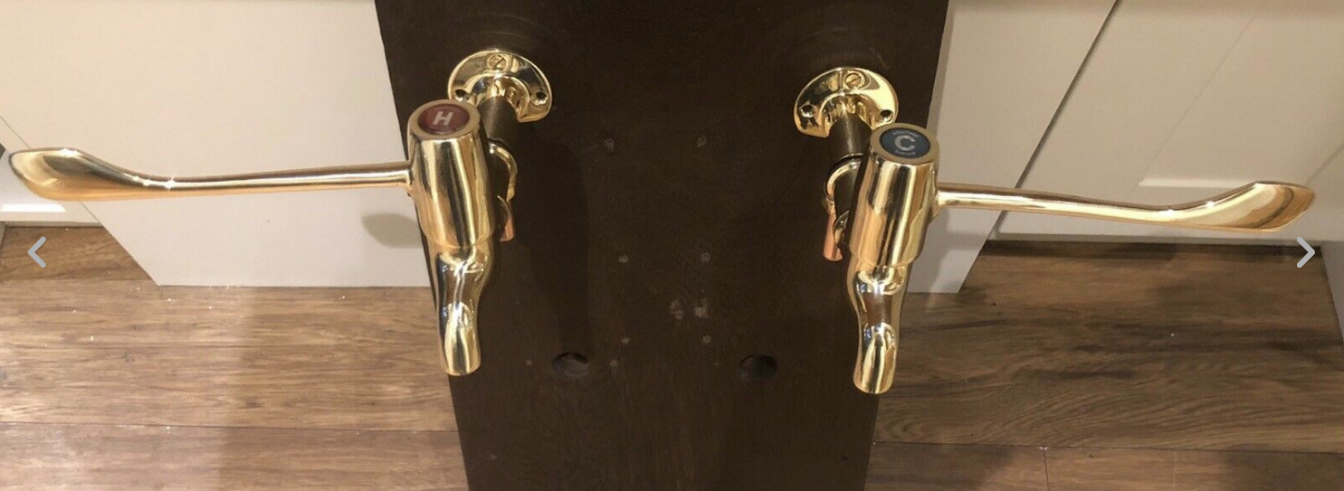 You are currently viewing Armitage Shanks lever-action bib taps in polished brass.