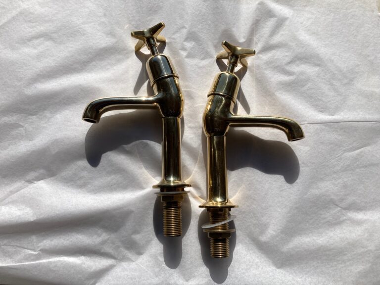 Read more about the article Polished brass, Kitchen pillar taps that lean forwards – SOLD.